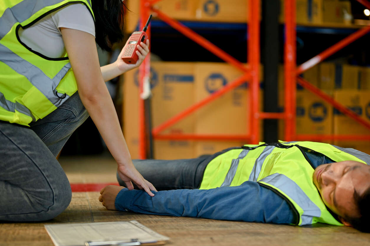 worker injury and other person checking 