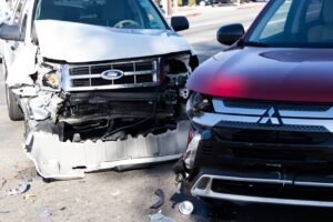 Driver Unconscious After Three-Vehicle Crash on W Grovers Ave